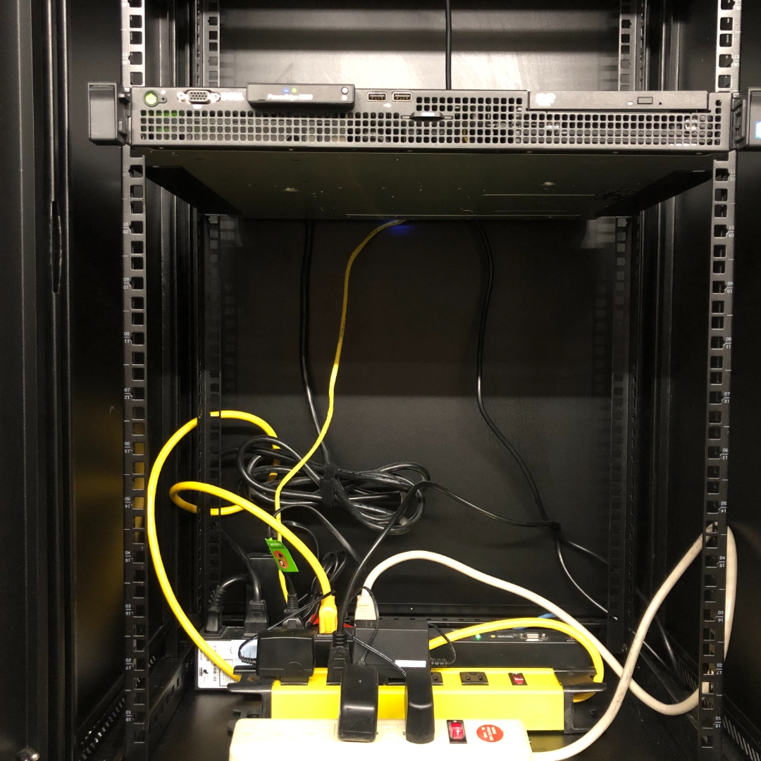 The building server rack — Dell 1U server and networking gear powering the SCADA and energy management platform
